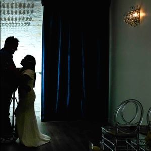 Preloved wedding dress used once David’s Bridal size 10 with slit lace with bag